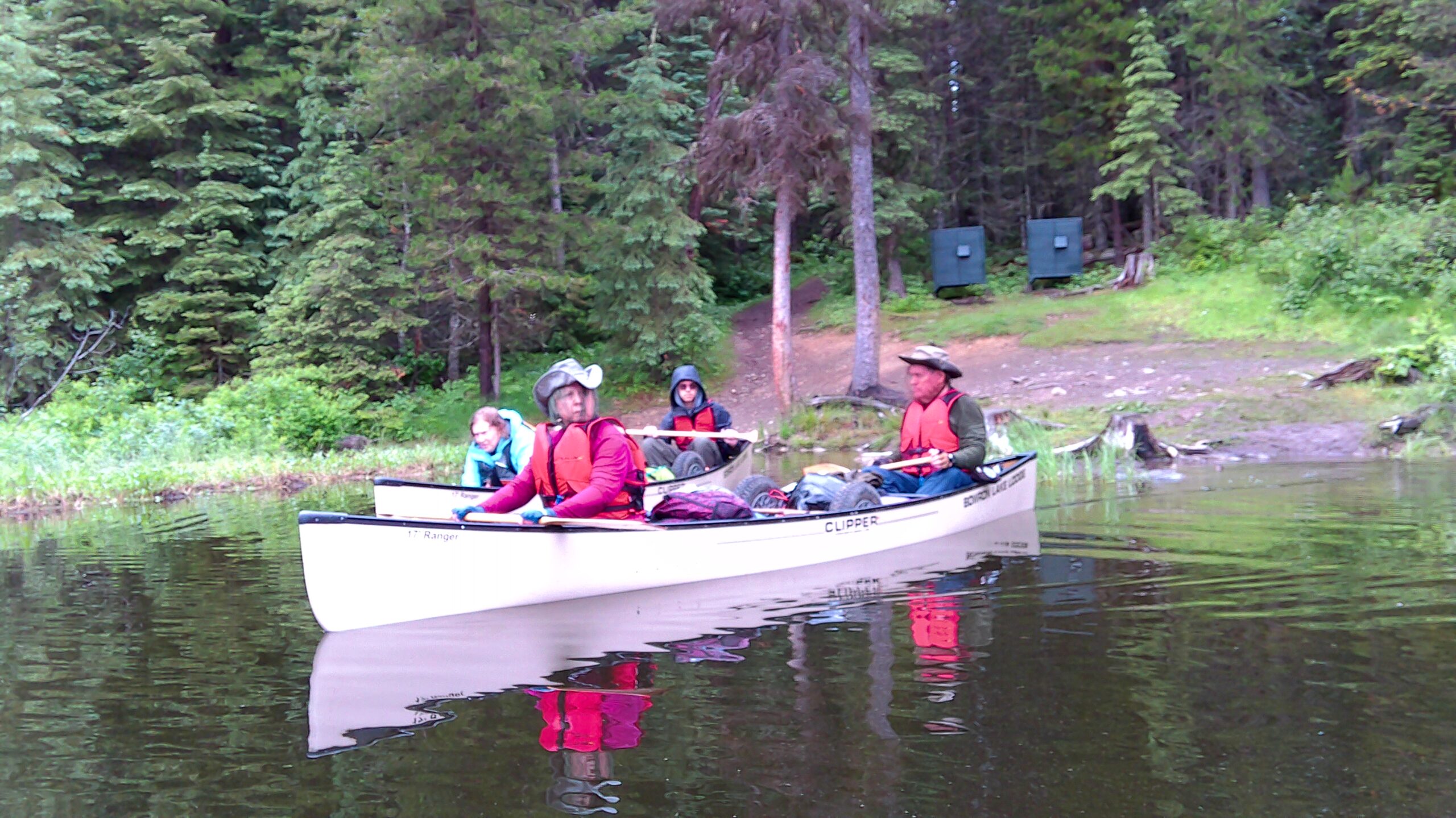 Scouts riding on a boat.