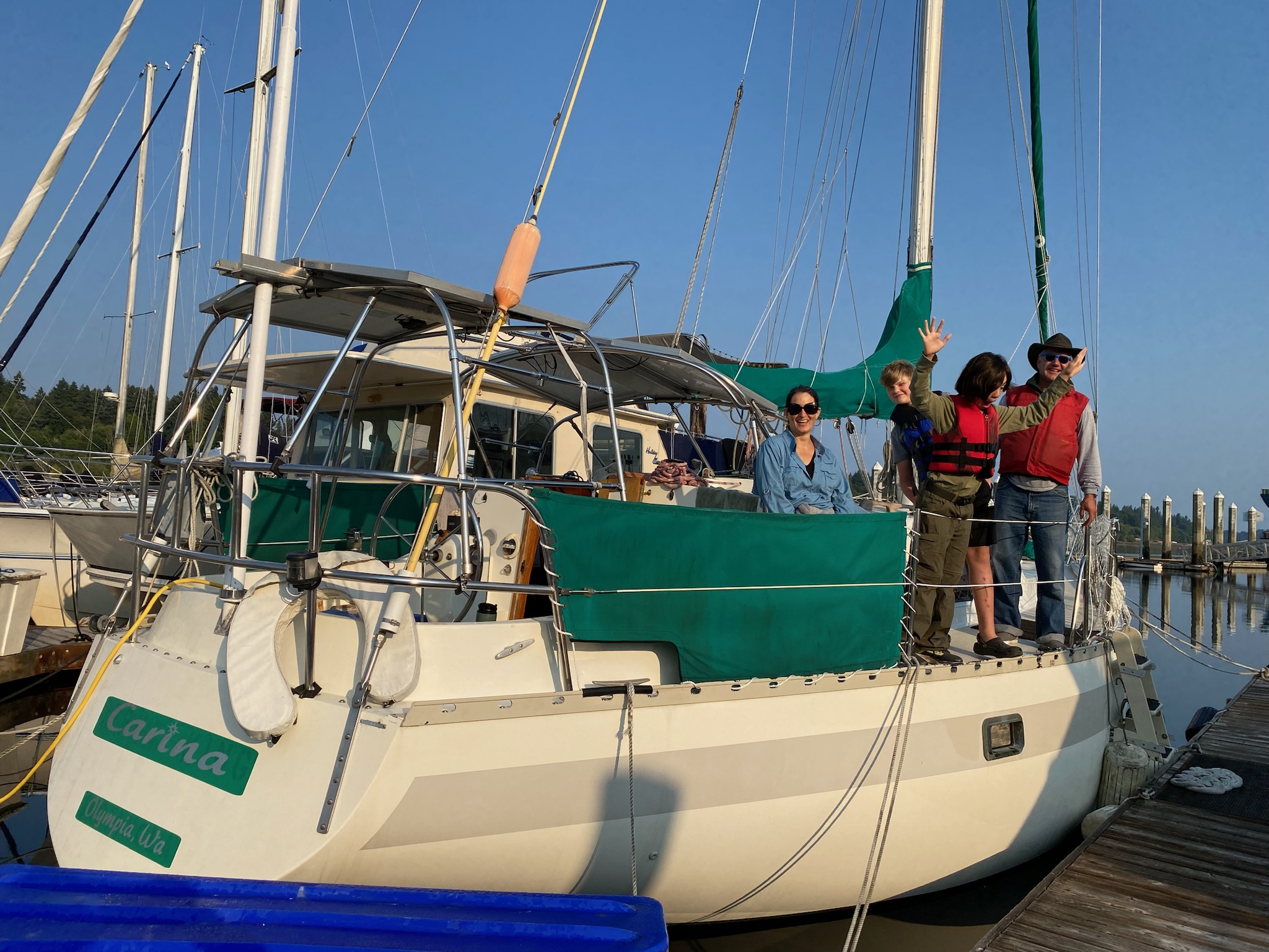 Sailboat with scouts on it at the dock