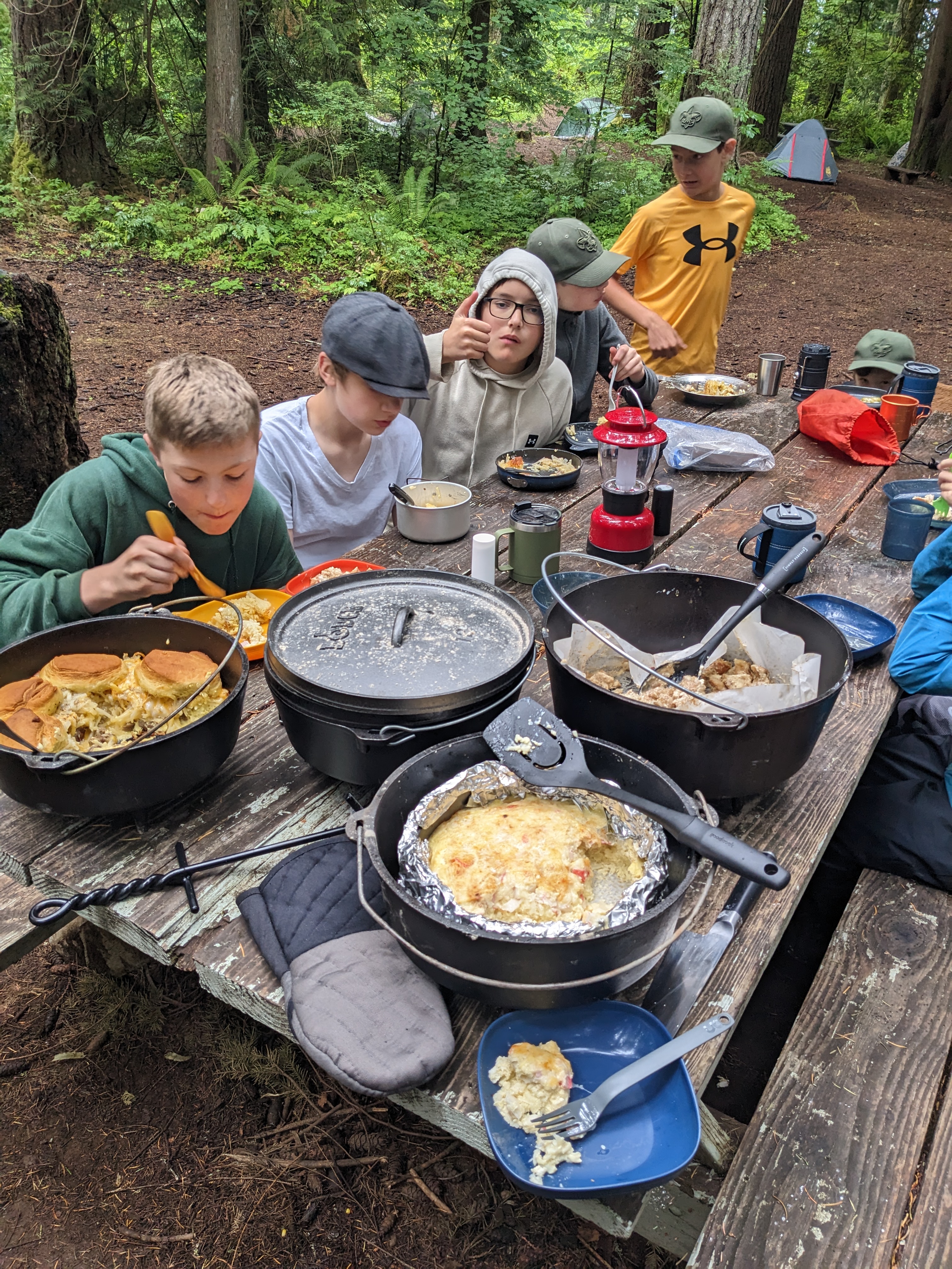 Scouts eating a meal